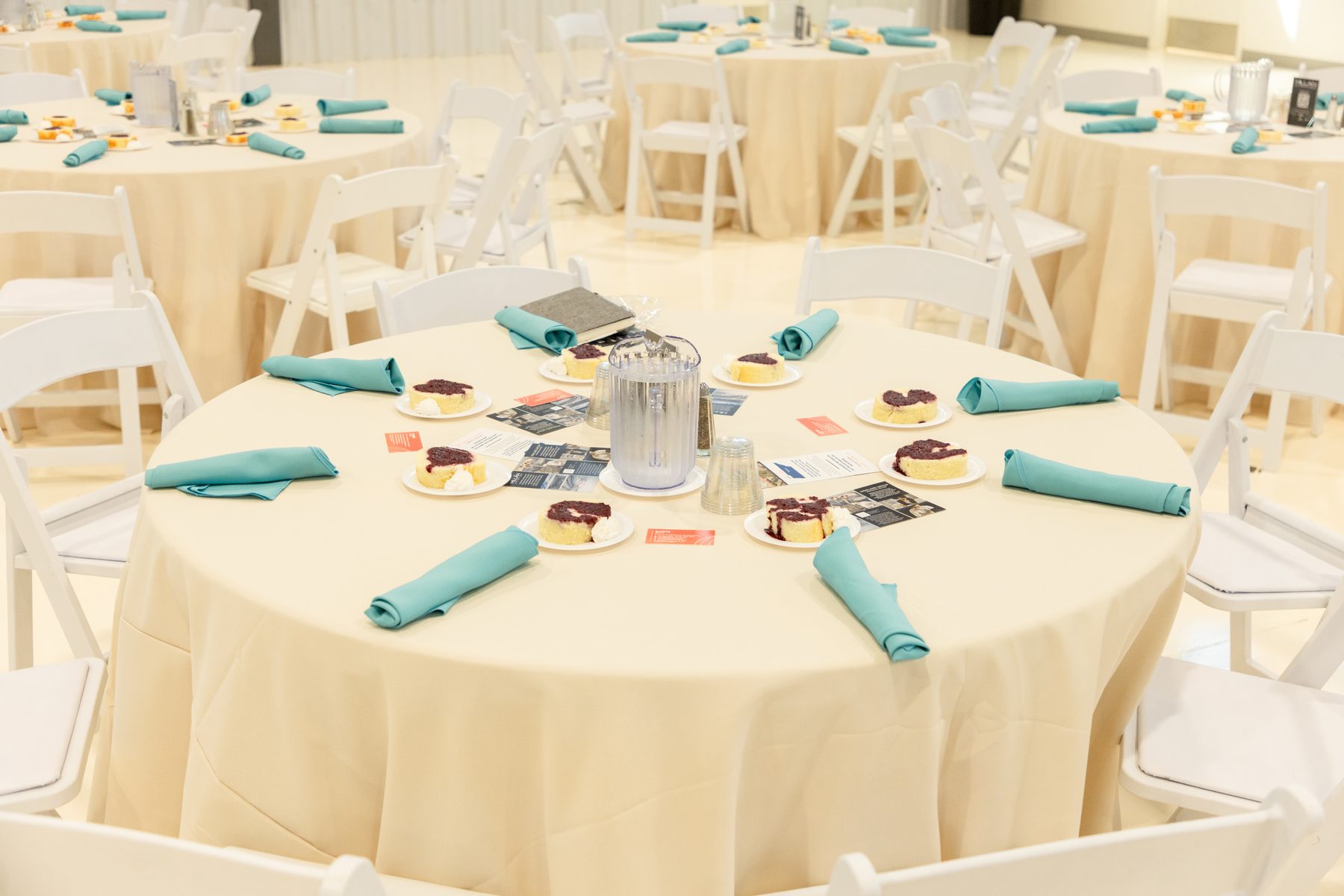 Corporate luncheon table setting with napkins and place settings
